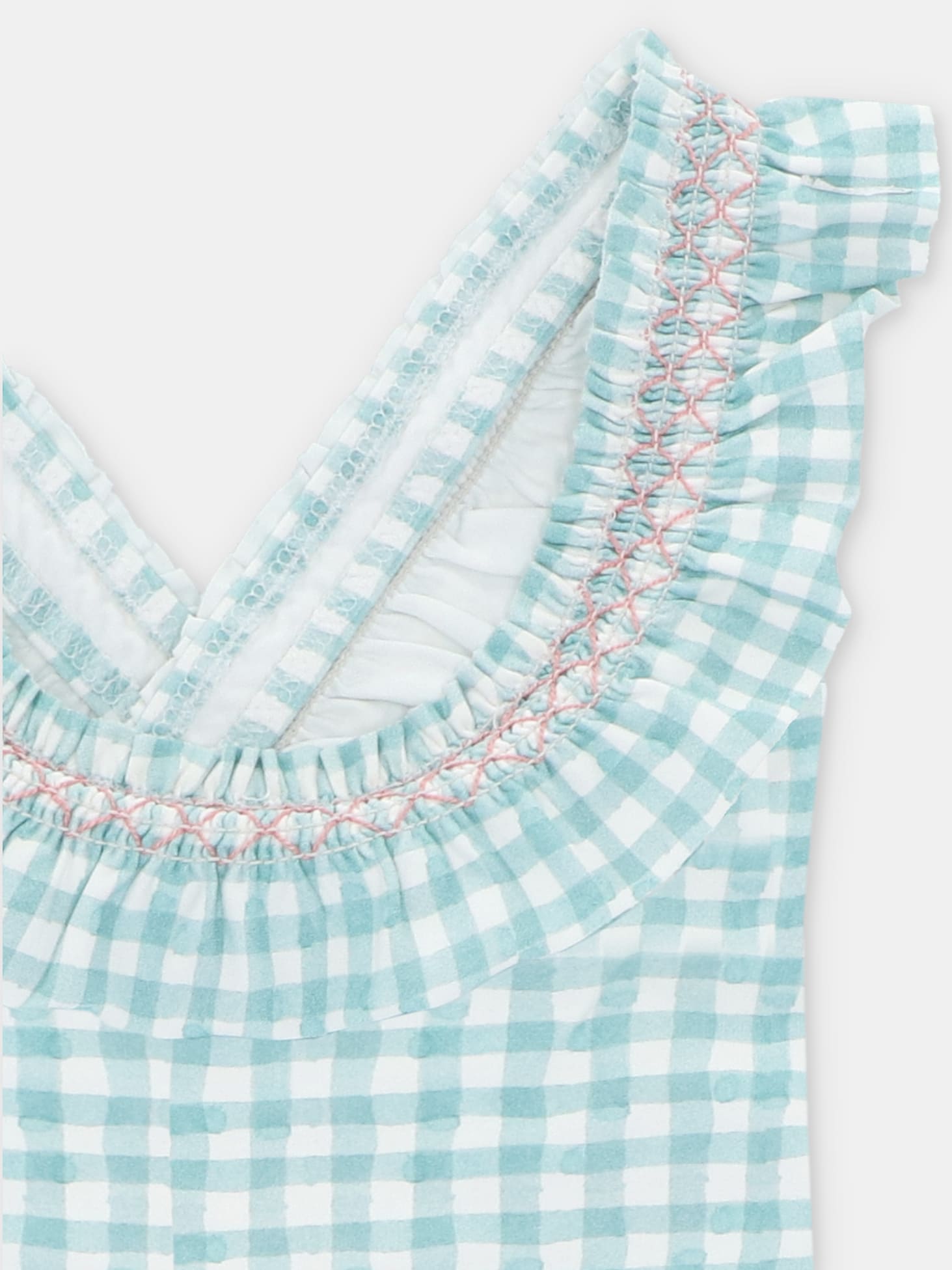 Détail du maillot de bain fille vichy vert et blanc à bretelles croisées dans le dos