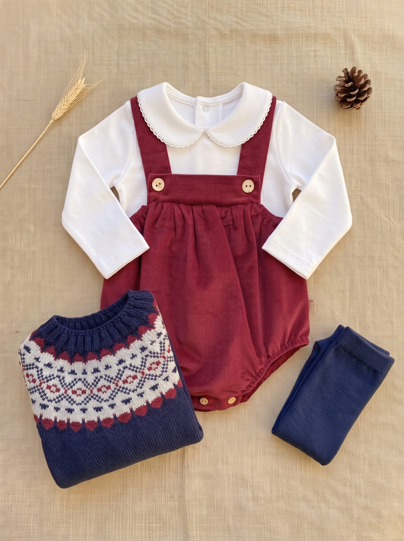 Burgundy romper, white blouse and patterned cardigan baby boy look
