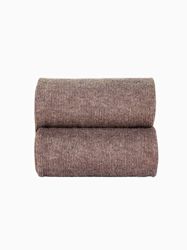 Détail du collant bébé uni de couleur taupe